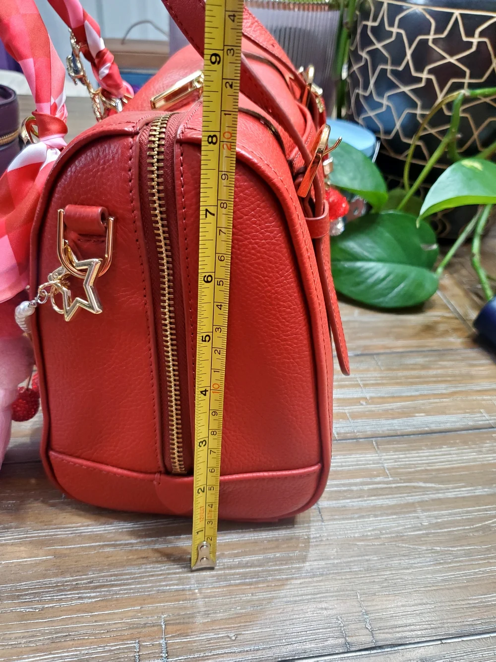 Red Leather Satchel Handbag with Decorative Charms